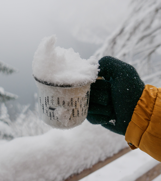 melting snow in a mug